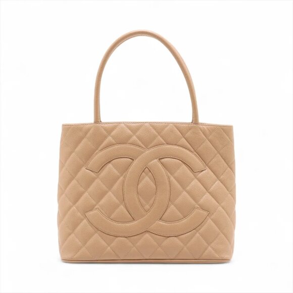 CHANEL Handbags - Chanel Re-release Caviar Skin Tote bag Beige Gold Metal Fittings